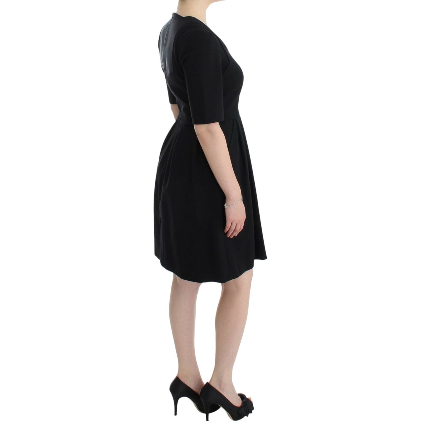 CO|TE Black short sleeve venus dress