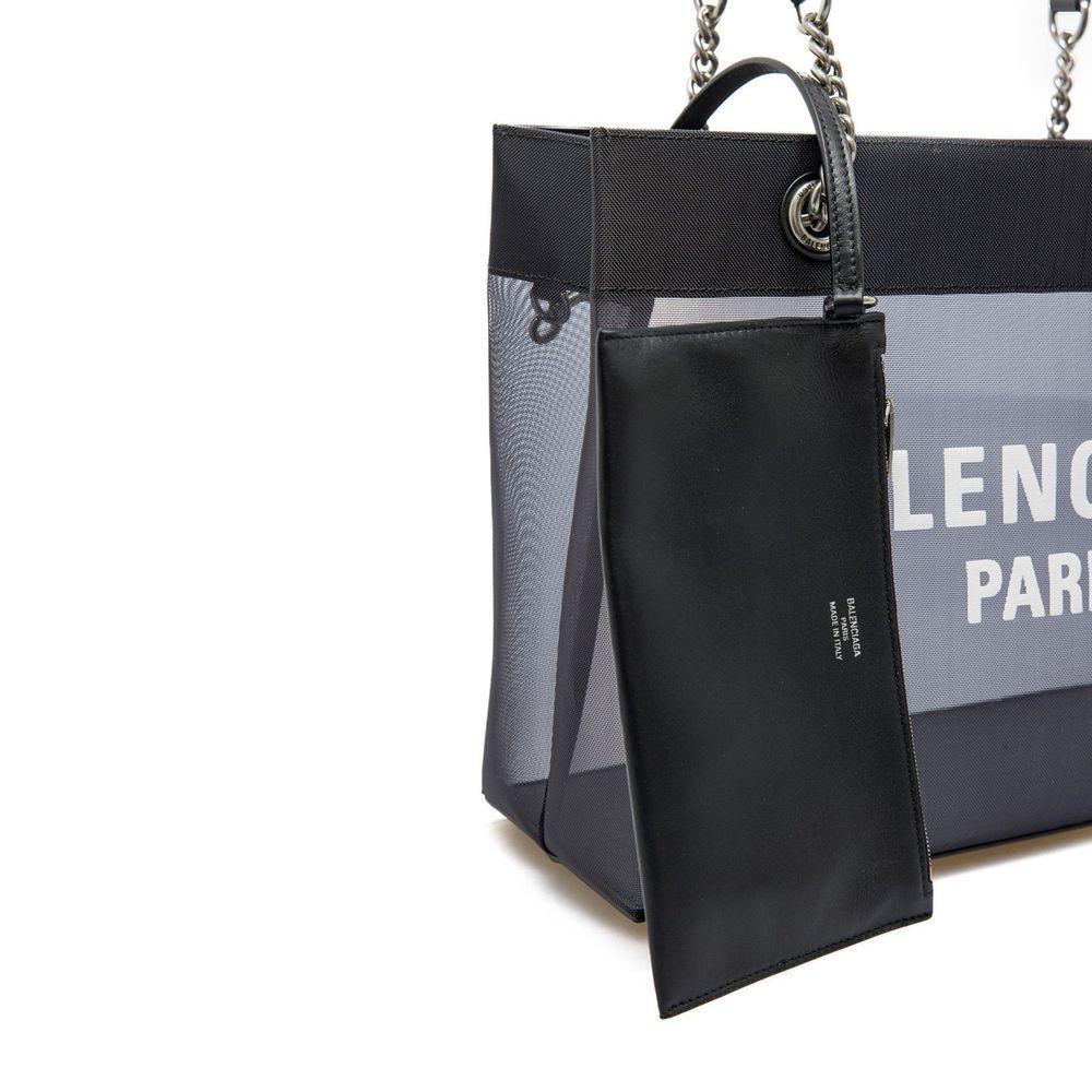 Front view with bag zipped and handles upright.