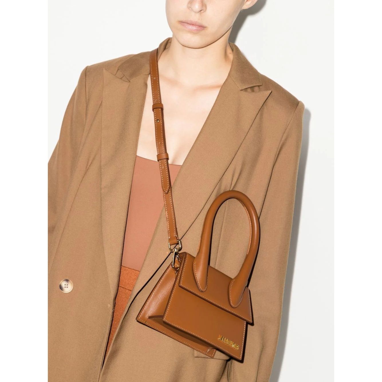 Front view with bag zipped and handles upright.